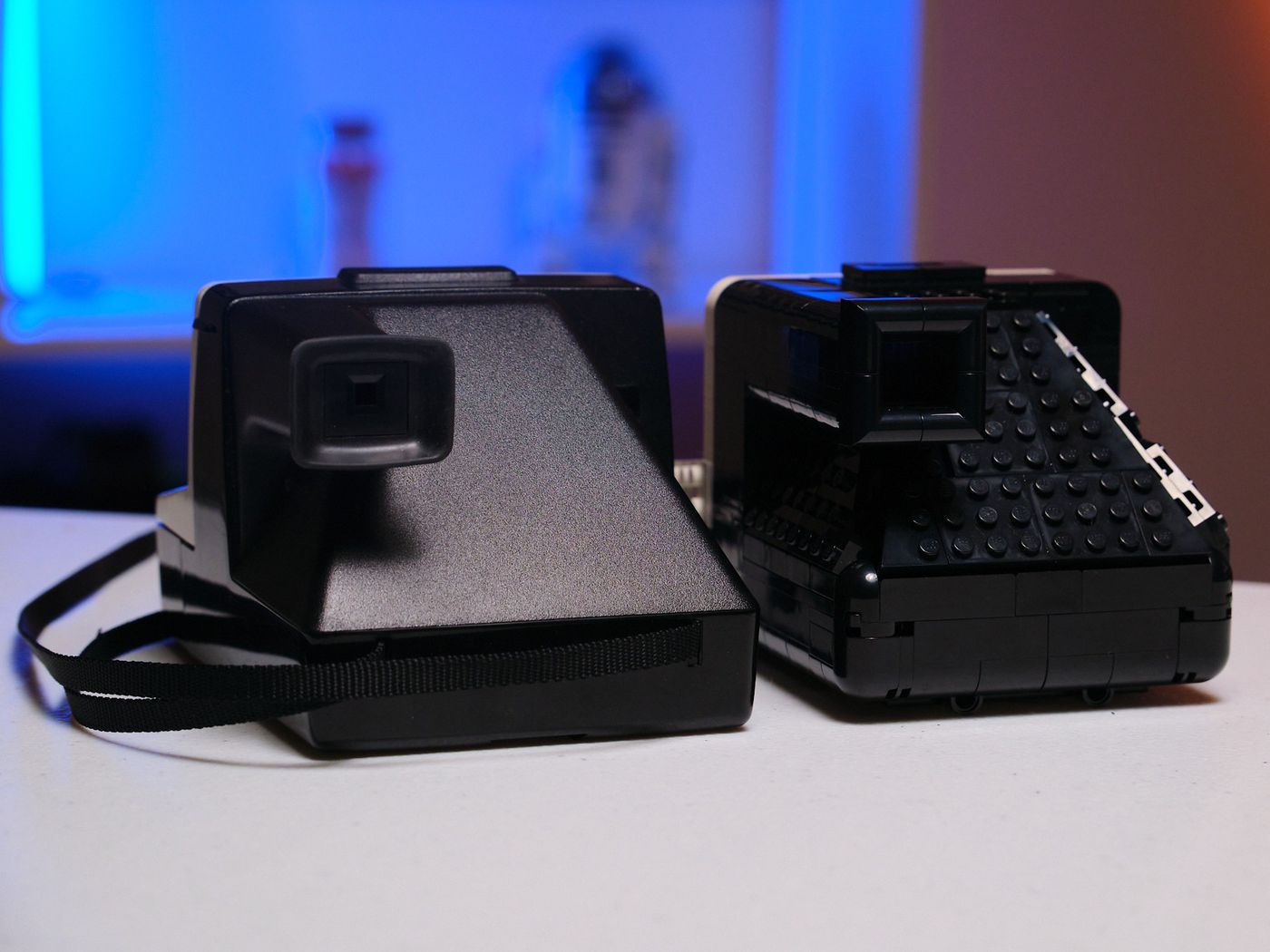 And here’s the real Polaroid’s textured back and the Lego Polaroid’s all-studded back, for comparison.