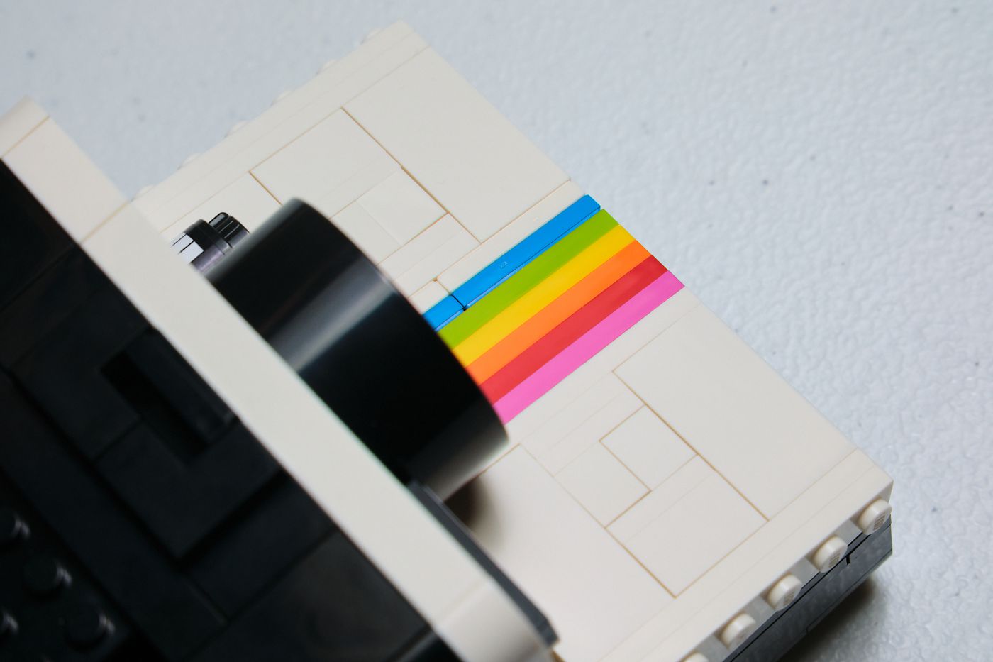 The brick-built rainbow stripe that adorns the front of the Lego camera. Here it is all together, close enough so you can see the gaps that show how it was made.