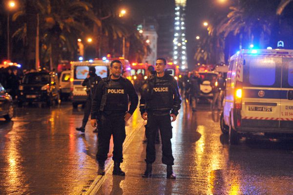 Tunisian police block the road near the site of the explosion.