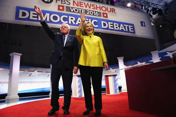 Hillary Clinton and Bernie Sanders wave to their adoring fans.